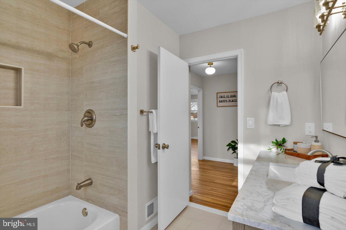 800 Marlowe Road Cherry Hill, NJ 08003 - Photo 38 of 55 a bathroom with a tub shower and mirror