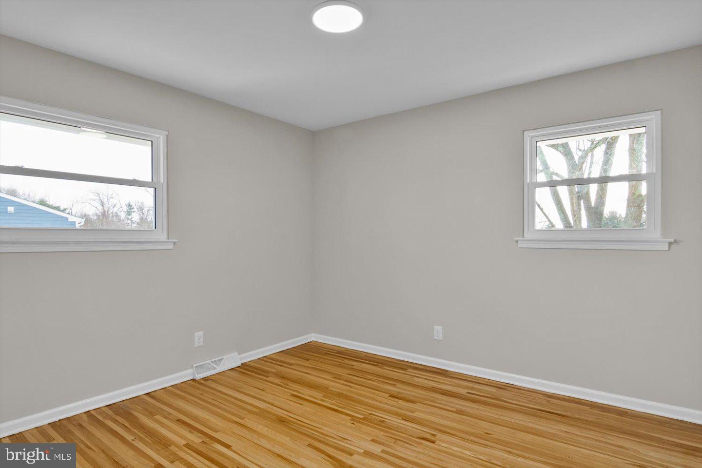 800 Marlowe Road Cherry Hill, NJ 08003 - Photo 39 of 55 a view of a room with wooden floor and windows