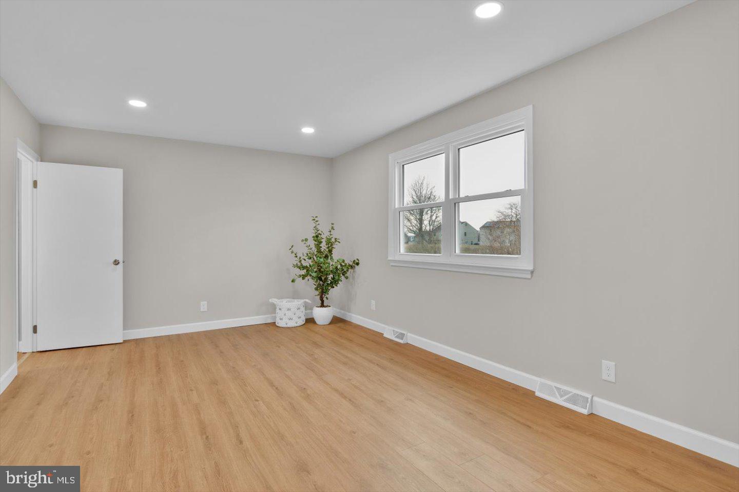 800 Marlowe Road Cherry Hill, NJ 08003 - Photo 10 of 55 wooden floor in an empty room with a window
