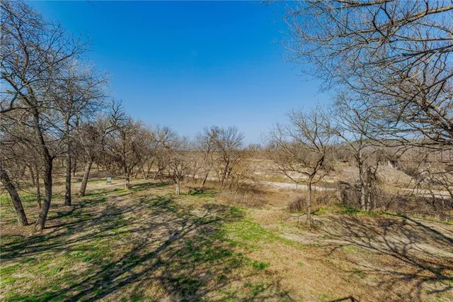 a view of yard covered with snow in outdoor space