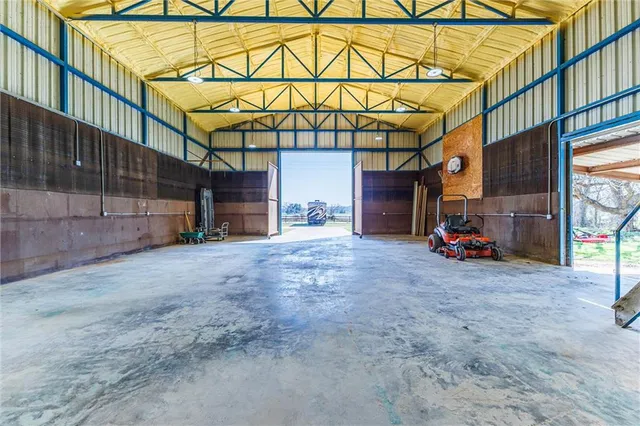 a view of a room with wooden walls