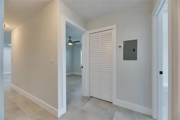 a view of a hallway with two rooms