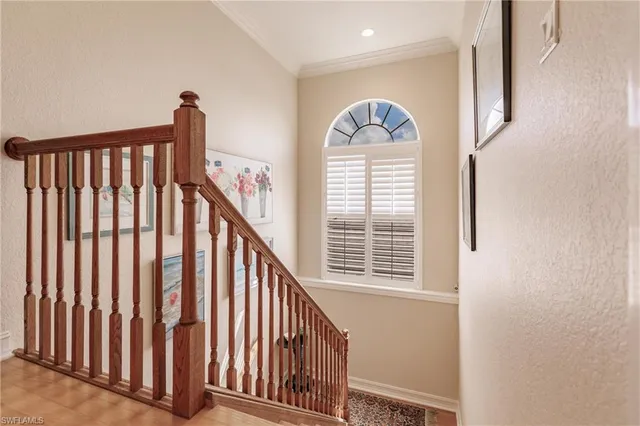 a view of a hallway with windows