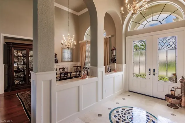 a bathroom with a double vanity sink a mirror and shower