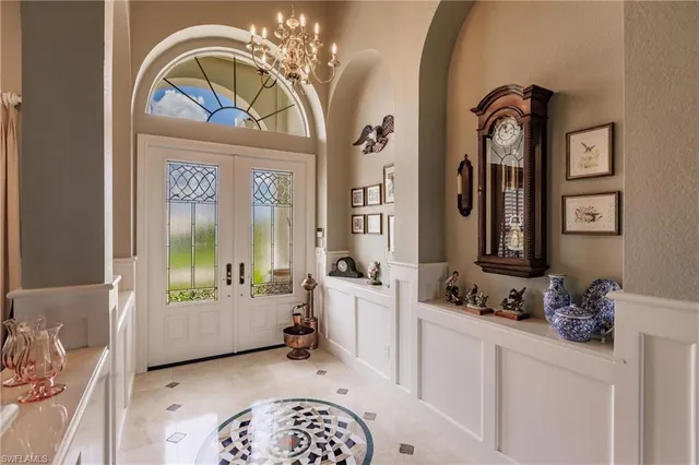 a view of hall way with mirror