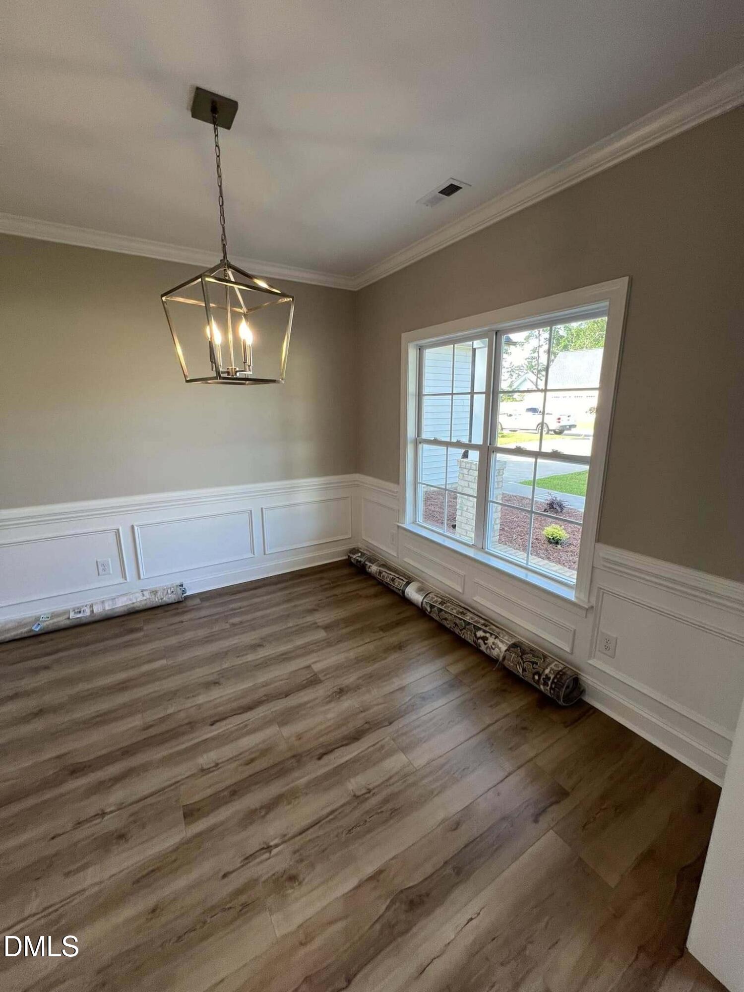 10 H Good Shepherd Trail Spring Spring Hope, NC 27882 - Photo 16 of 34 a view of an empty room with wooden floor and a window
