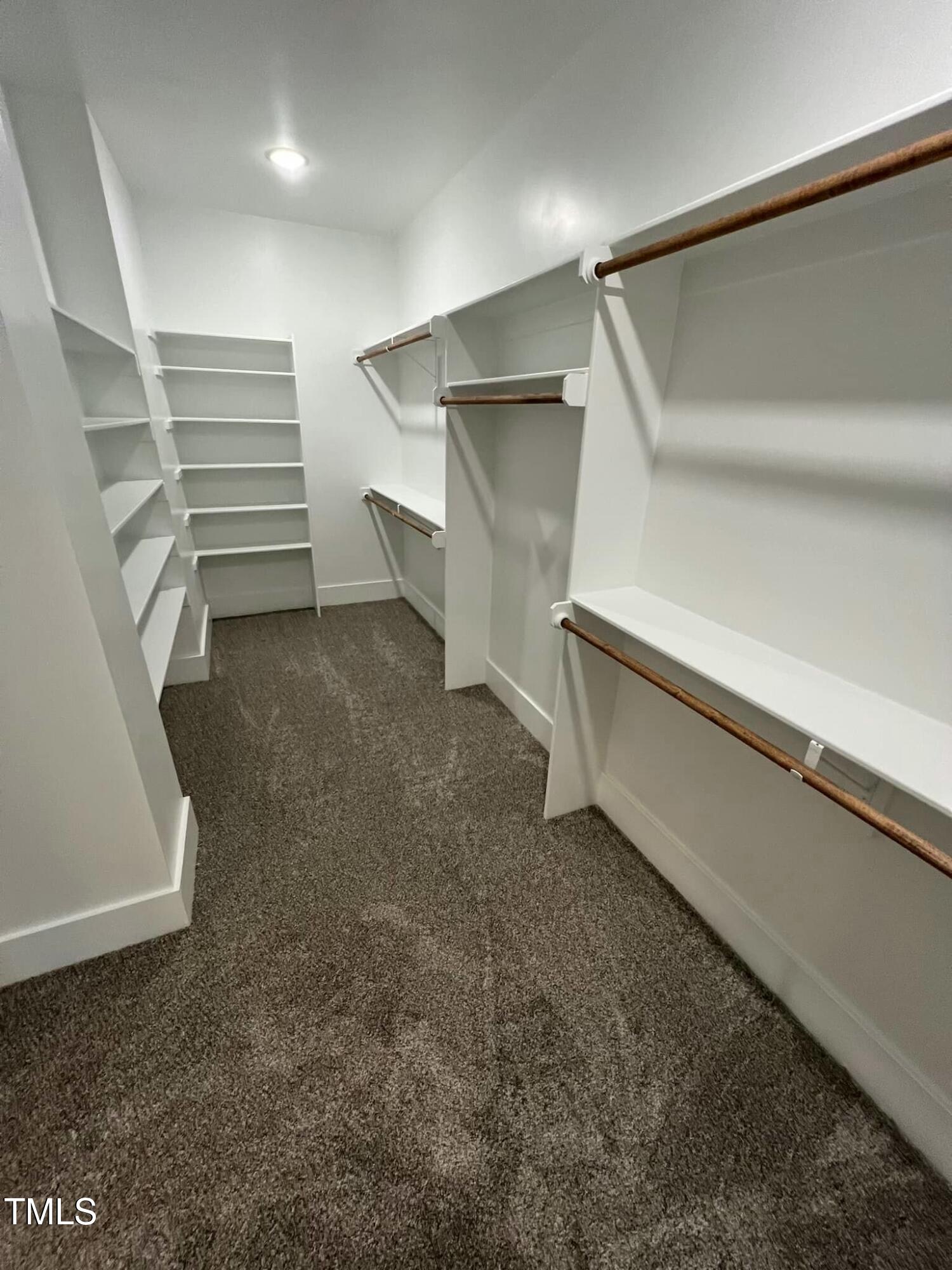 10 H Good Shepherd Trail Spring Spring Hope, NC 27882 - Photo 21 of 34 a view of an empty walk in closet