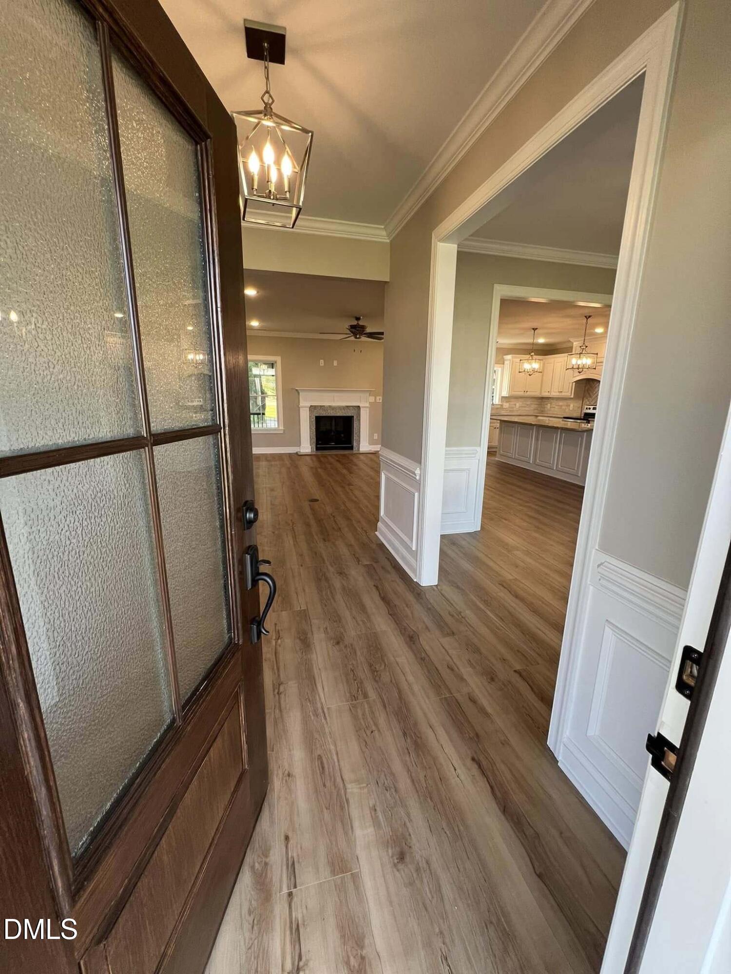 10 H Good Shepherd Trail Spring Spring Hope, NC 27882 - Photo 3 of 34 a view of a hallway view with wooden floor and staircase