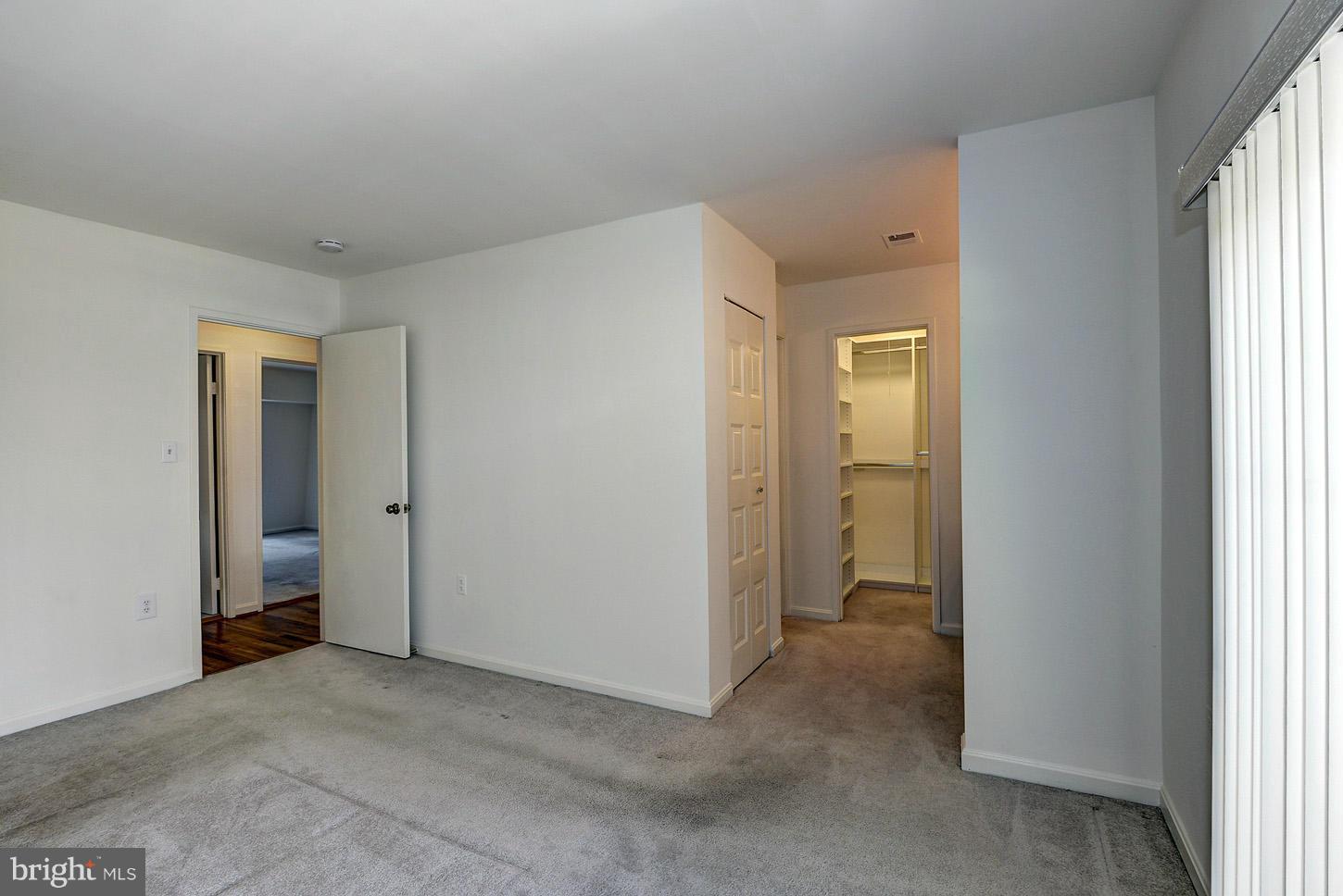 7942 Inverness Ridge Road Potomac, MD 20854 - Photo 14 of 24 a view of a big room with closet and windows