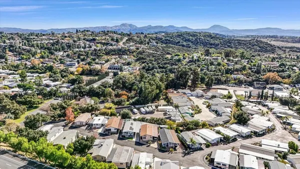 an aerial view of a city with lots of residential buildings