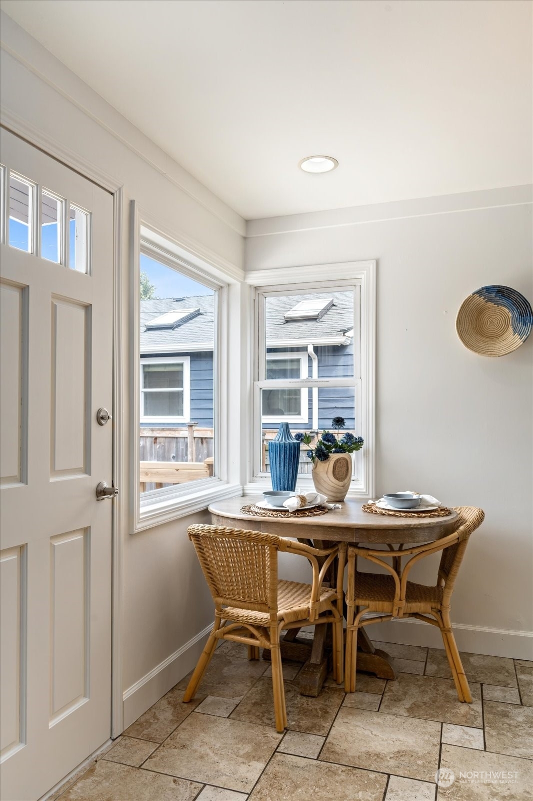 4839 50th Avenue Southwest Seattle, WA 98116 - Photo 11 of 31 a view of a dining room with furniture and window