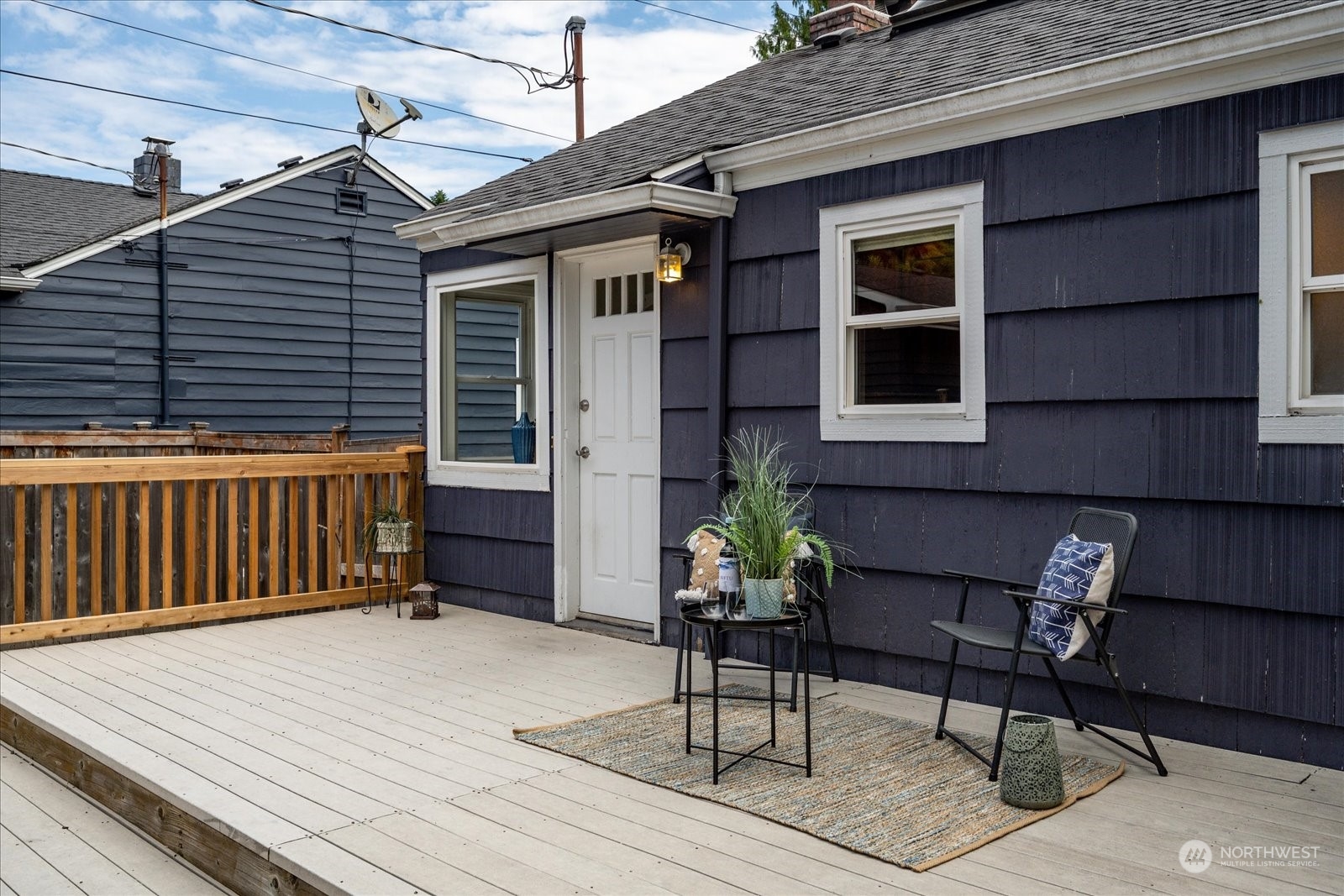 4839 50th Avenue Southwest Seattle, WA 98116 - Photo 27 of 31 a backyard of a house with seating space