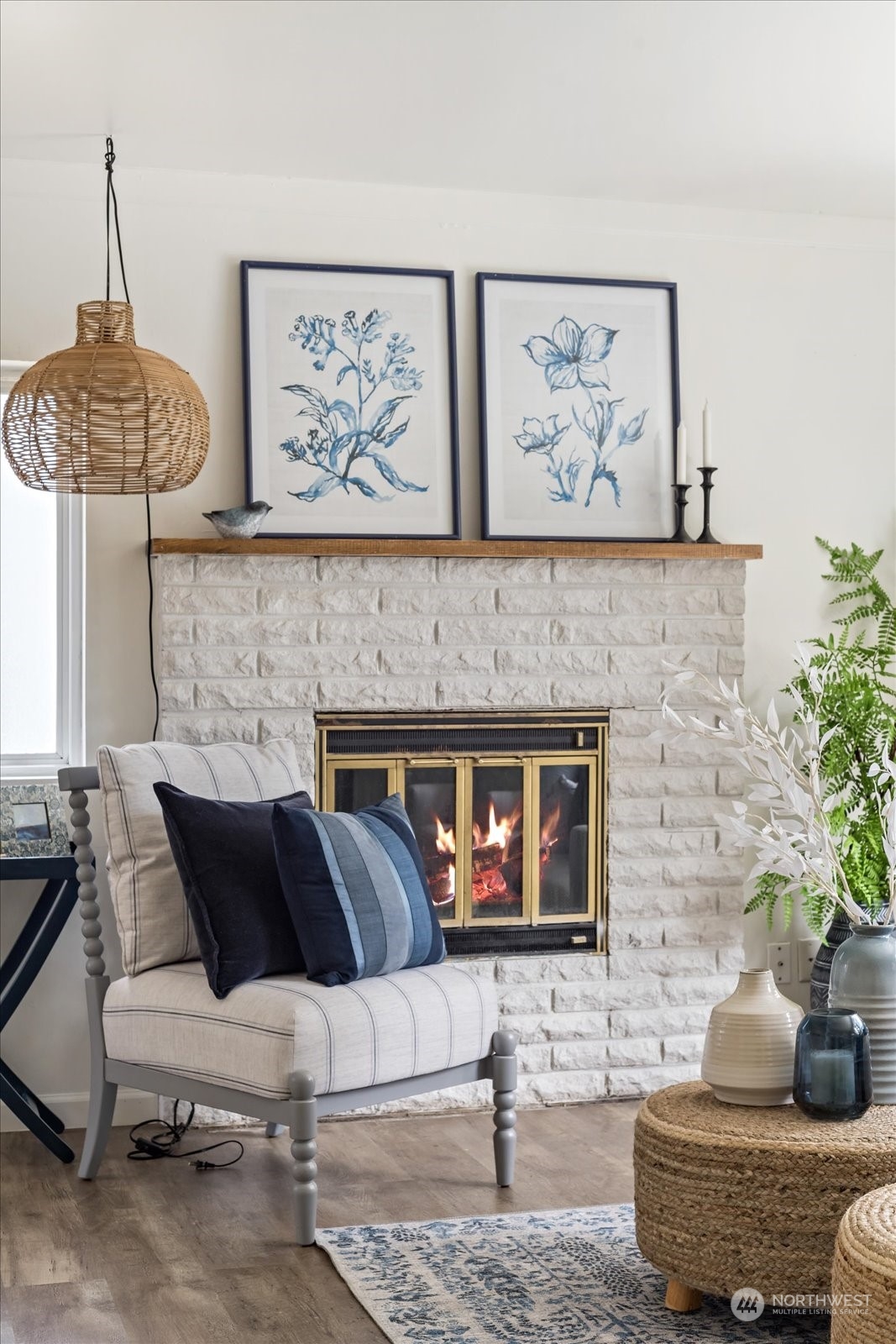 4839 50th Avenue Southwest Seattle, WA 98116 - Photo 5 of 31 a living room with furniture and a fireplace