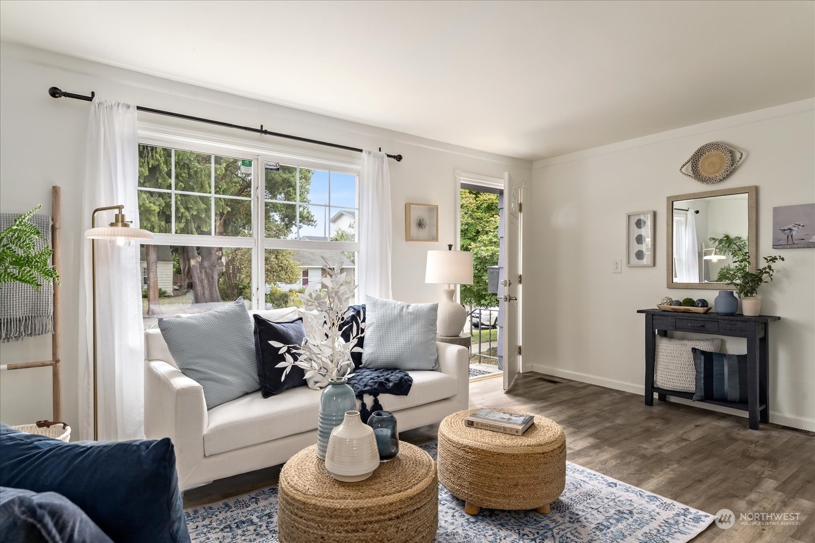 4839 50th Avenue Southwest Seattle, WA 98116 - Photo 6 of 31 a living room with furniture and a large window