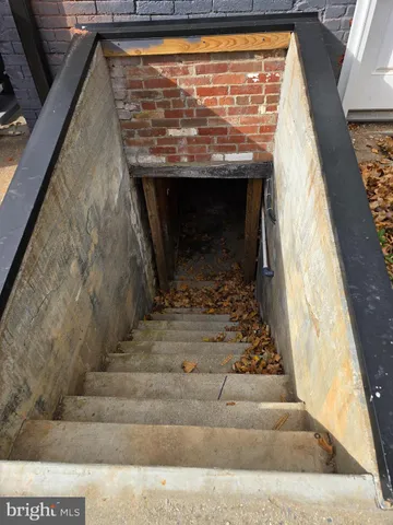 a view of fireplace and wooden floor