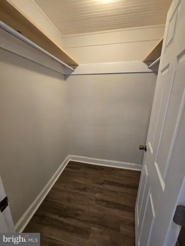 a view of small space with racks on the wall