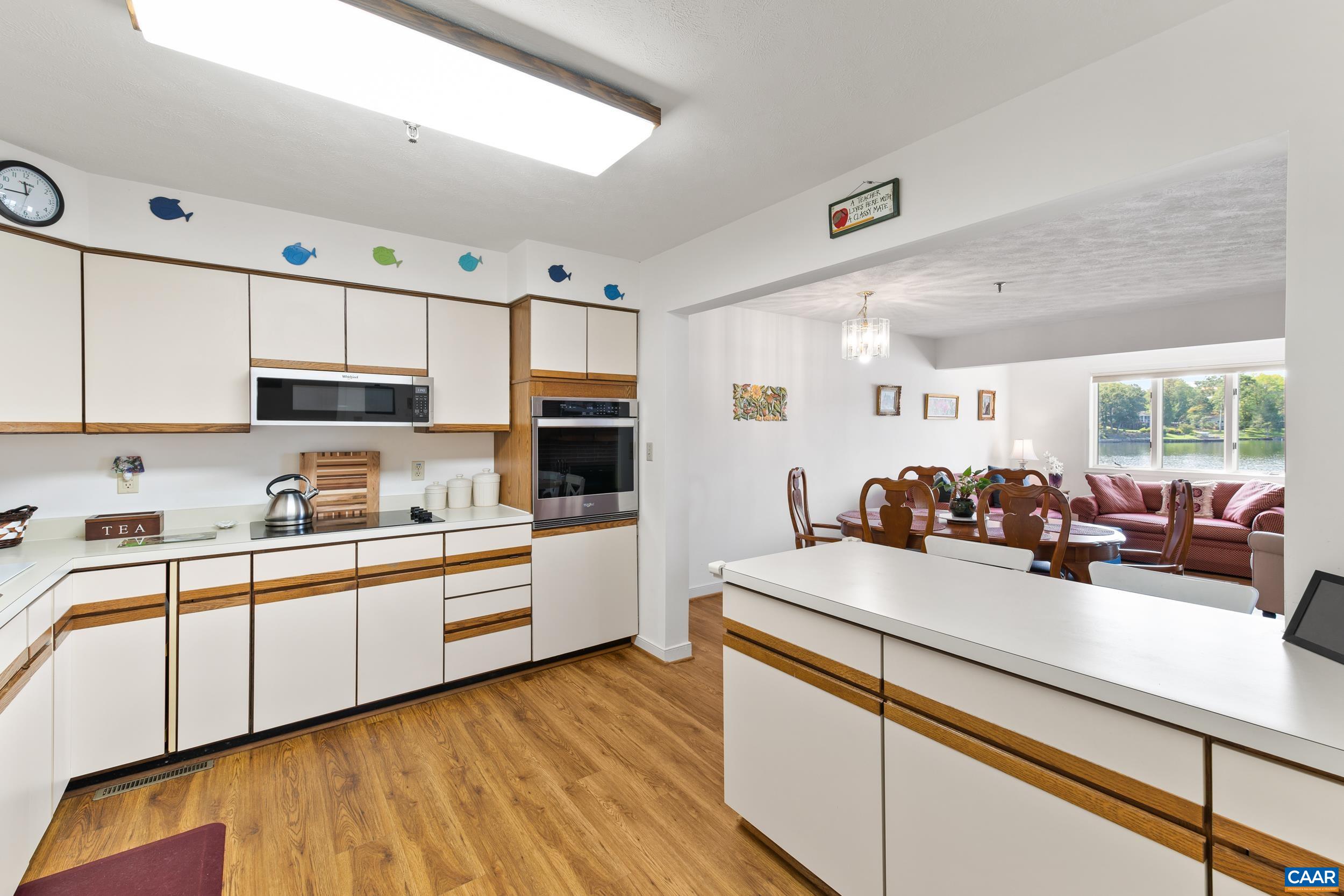 C2 Marina Point Palmyra, VA 22963 - Photo 16 of 27 a kitchen with sink a stove and cabinets