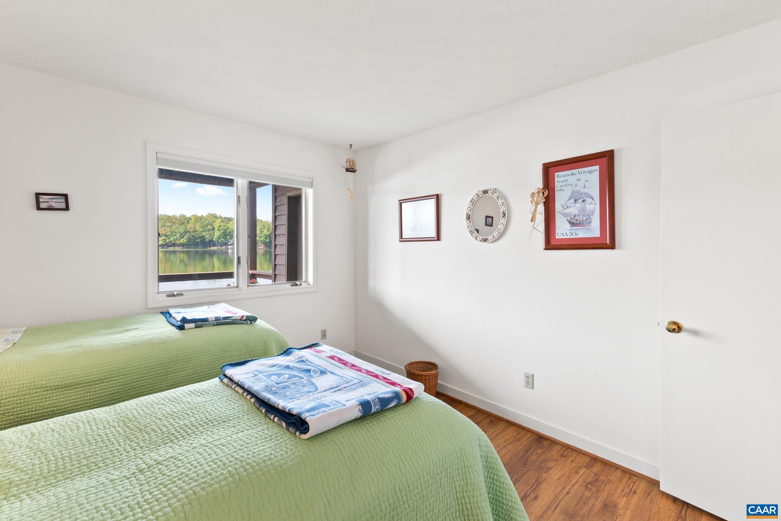 C2 Marina Point Palmyra, VA 22963 - Photo 22 of 27 a bedroom with a bed and a window