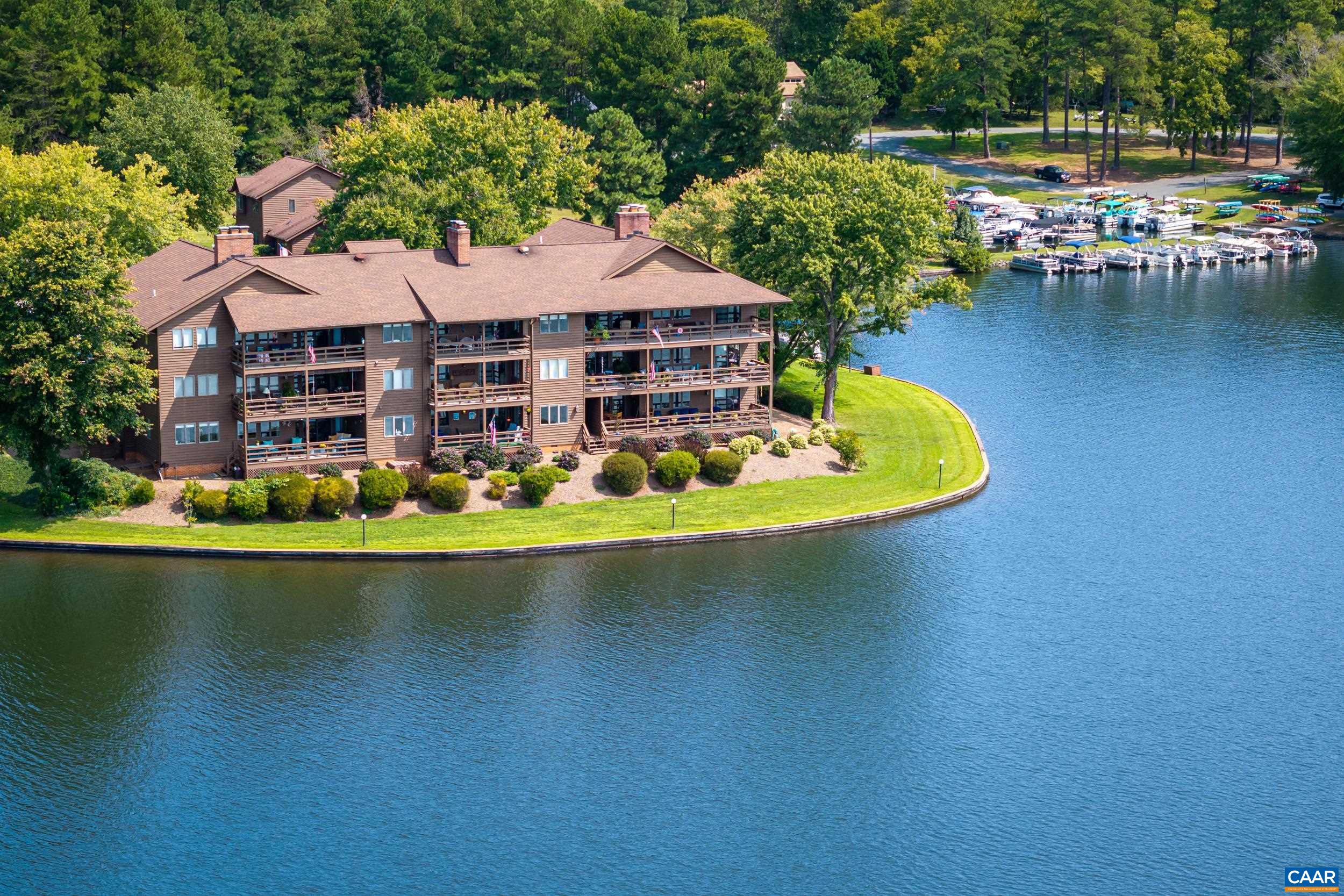 C2 Marina Point Palmyra, VA 22963 - Photo 6 of 27 a front view of a house with swimming pool and outdoor seating