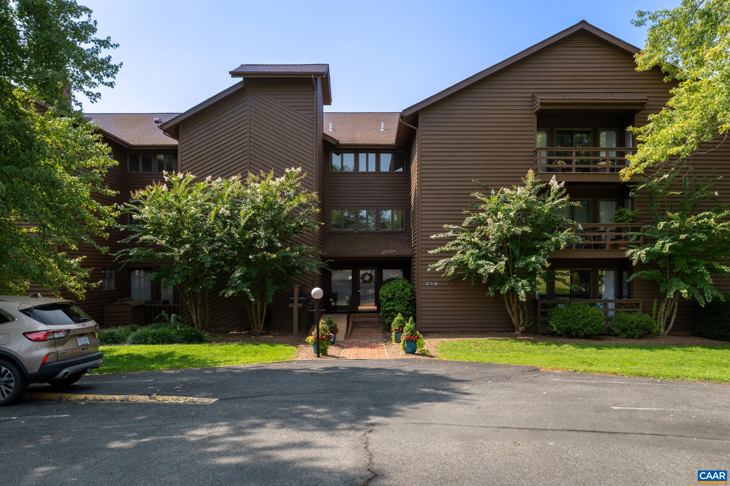 C2 Marina Point Palmyra, VA 22963 - Photo 8 of 27 a front view of a house with garden