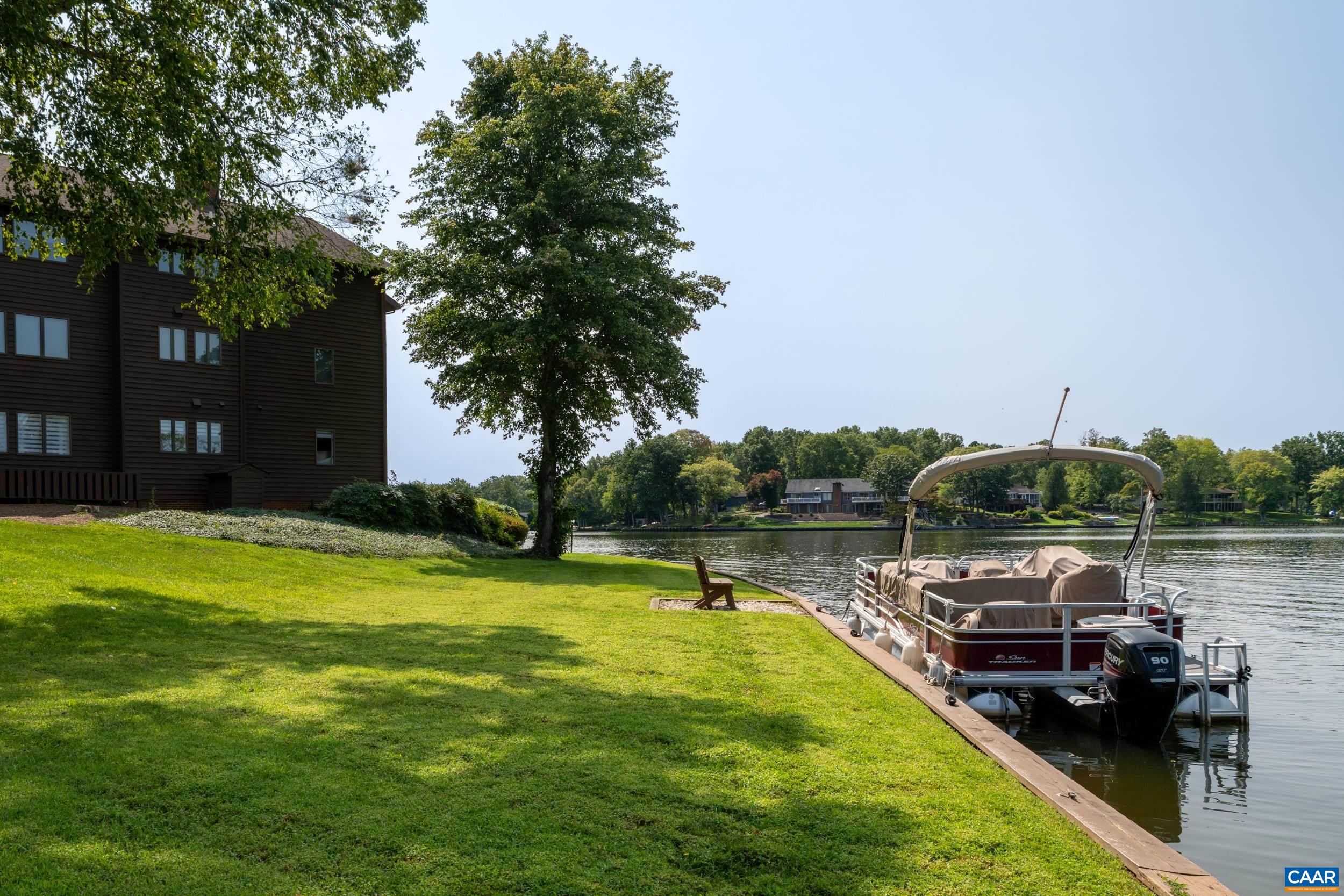 C2 Marina Point Palmyra, VA 22963 - Photo 10 of 27 a swimming pool view with a outdoor seating