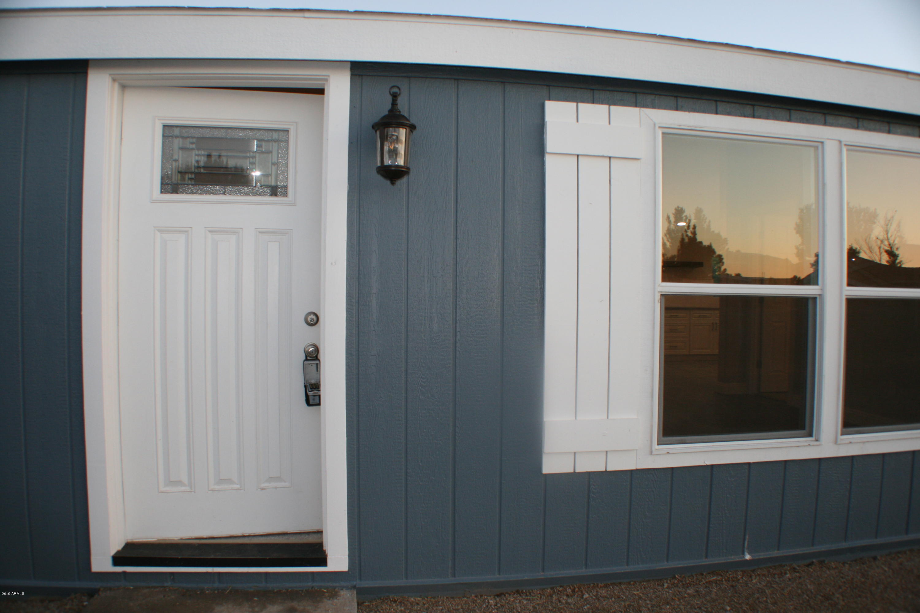 NEW FRONT DOOR AND CUSTOM SHUTTERS