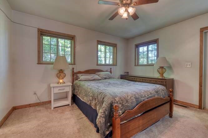 441 Foxfire Road Blairsville, GA 30512 - Photo 24 of 73 a bedroom with a bed dresser and a window