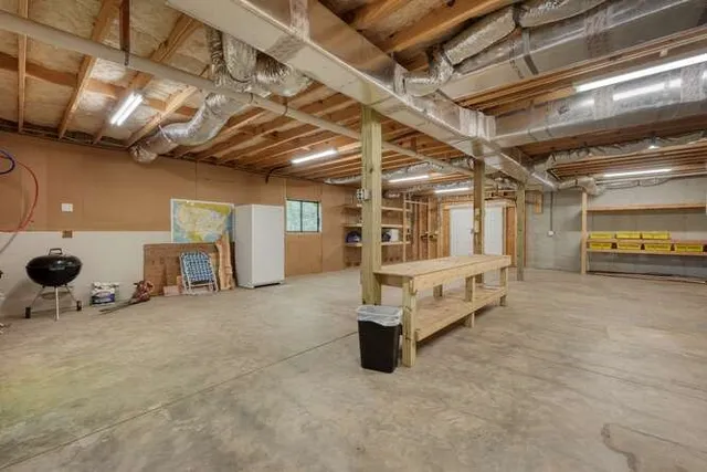 a living room with furniture and a table