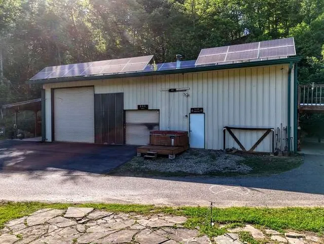 a backyard of a house with lots of green space