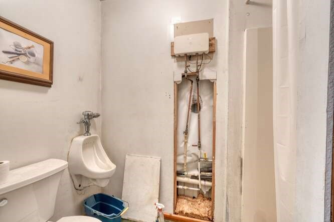 441 Foxfire Road Blairsville, GA 30512 - Photo 50 of 73 a white toilet sitting next to a bathroom sink