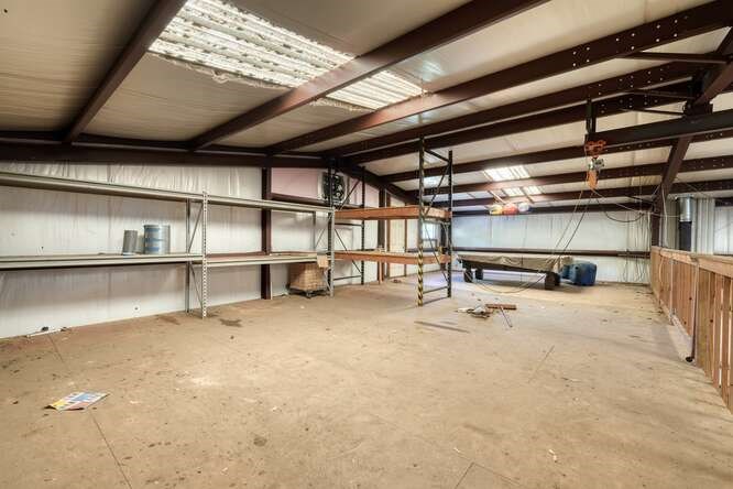 441 Foxfire Road Blairsville, GA 30512 - Photo 53 of 73 a view of an empty room with racks