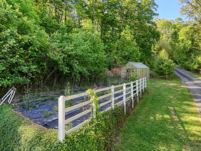 441 Foxfire Road Blairsville, GA 30512 - Photo 60 of 73 a view of a wooden fence and a bench in the background