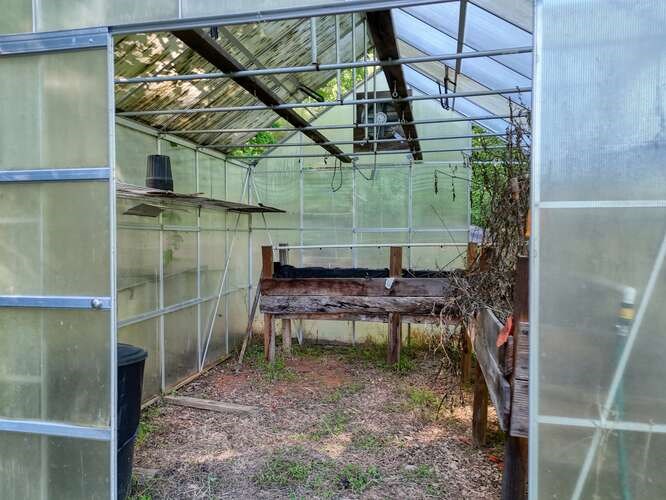 441 Foxfire Road Blairsville, GA 30512 - Photo 62 of 73 a backyard of a house with outdoor seating and water fountain