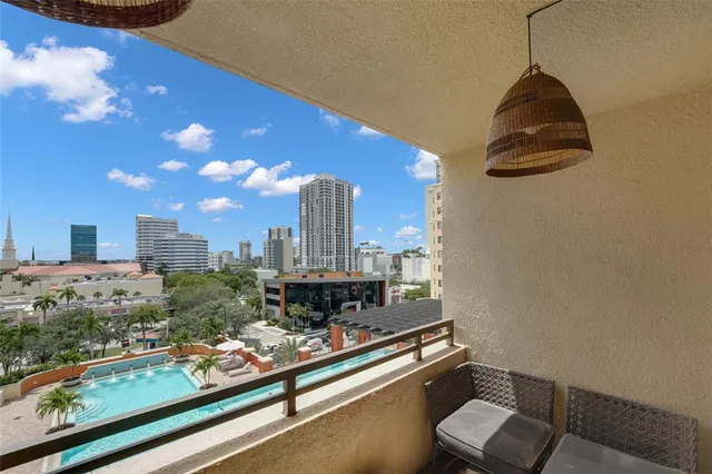 a room with furniture and a flat screen tv
