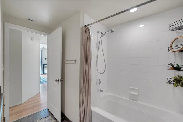 a bathroom with a sink toilet a mirror and vanity