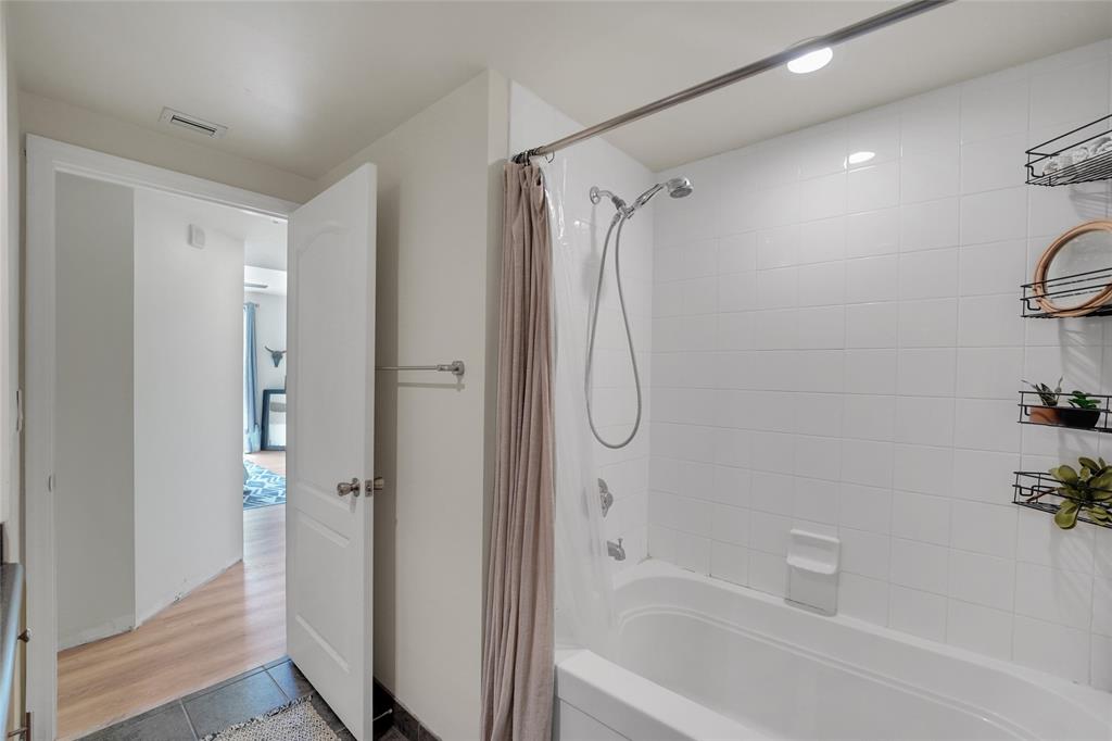 100 North Federal Highway, Unit 819 Fort Lauderdale, FL 33301 - Photo 22 of 36 a bathroom with a bathtub and a shower