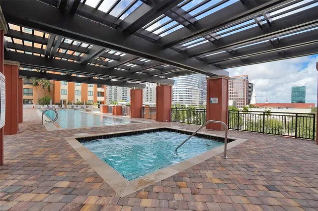 a living room with furniture and flat screen tv