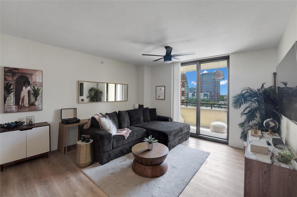 100 North Federal Highway, Unit 819 Fort Lauderdale, FL 33301 - Photo 3 of 36 a living room with furniture and a large window