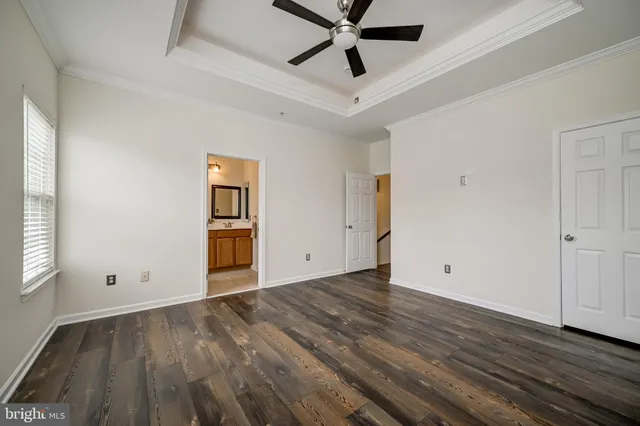a bathroom with a double vanity sink mirror and shower