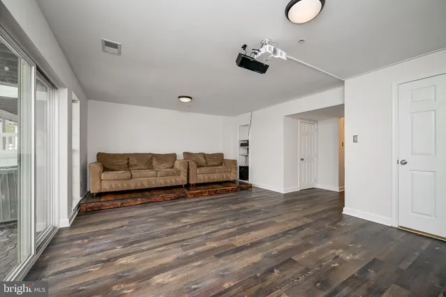 a view of a backyard with a cabin