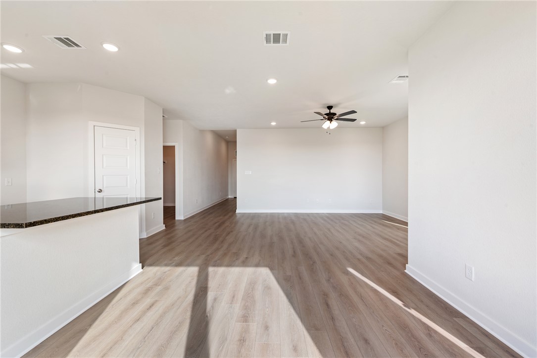 2415 Rooke Road Bryan, TX 77807 - Photo 18 of 36 a view of a room with wooden floor