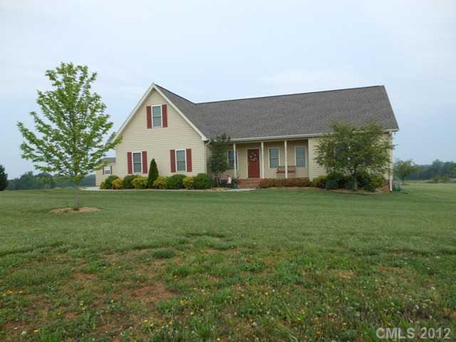 112 Tatum Road Olin, NC 28660 - Photo 2 of 16 a front view of house with yard and green space