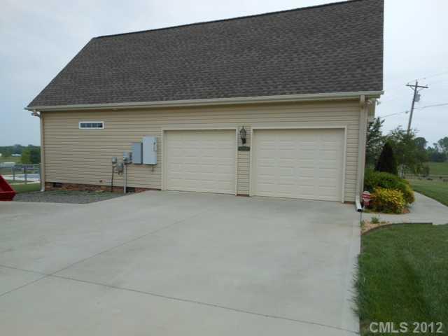 112 Tatum Road Olin, NC 28660 - Photo 13 of 16 a view of garage and yard