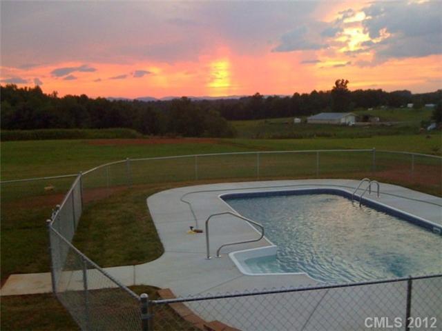 112 Tatum Road Olin, NC 28660 - Photo 5 of 16 a view of a wooden bridge