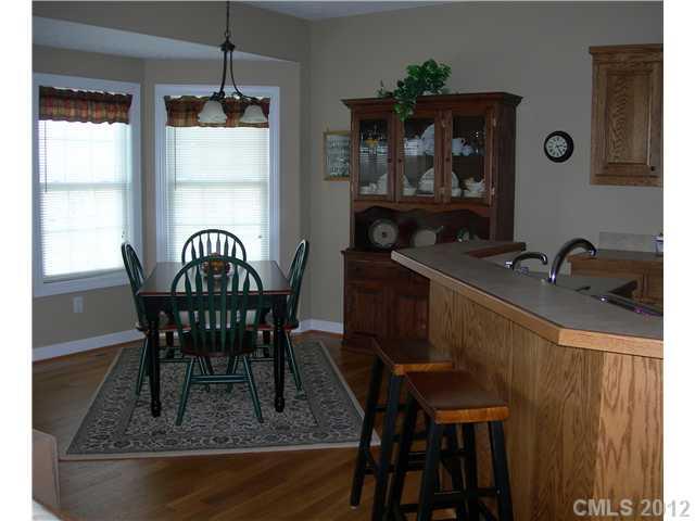 112 Tatum Road Olin, NC 28660 - Photo 7 of 16 a dining room with furniture and window