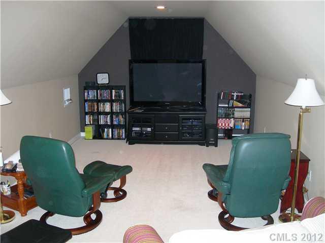 112 Tatum Road Olin, NC 28660 - Photo 9 of 16 a living room with furniture and a flat screen tv