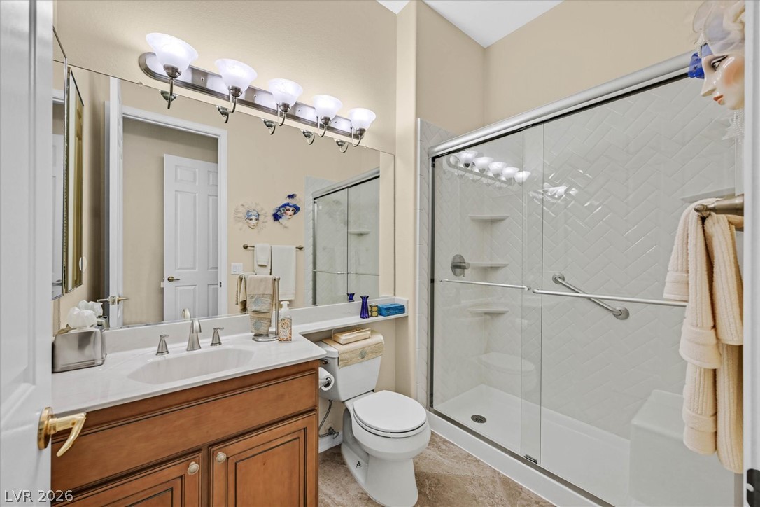 1823 Baton Rouge Street Henderson, NV 89052 - Photo 26 of 60 Clean lines and a spacious walk-in shower define this well-appointed bathroom space.