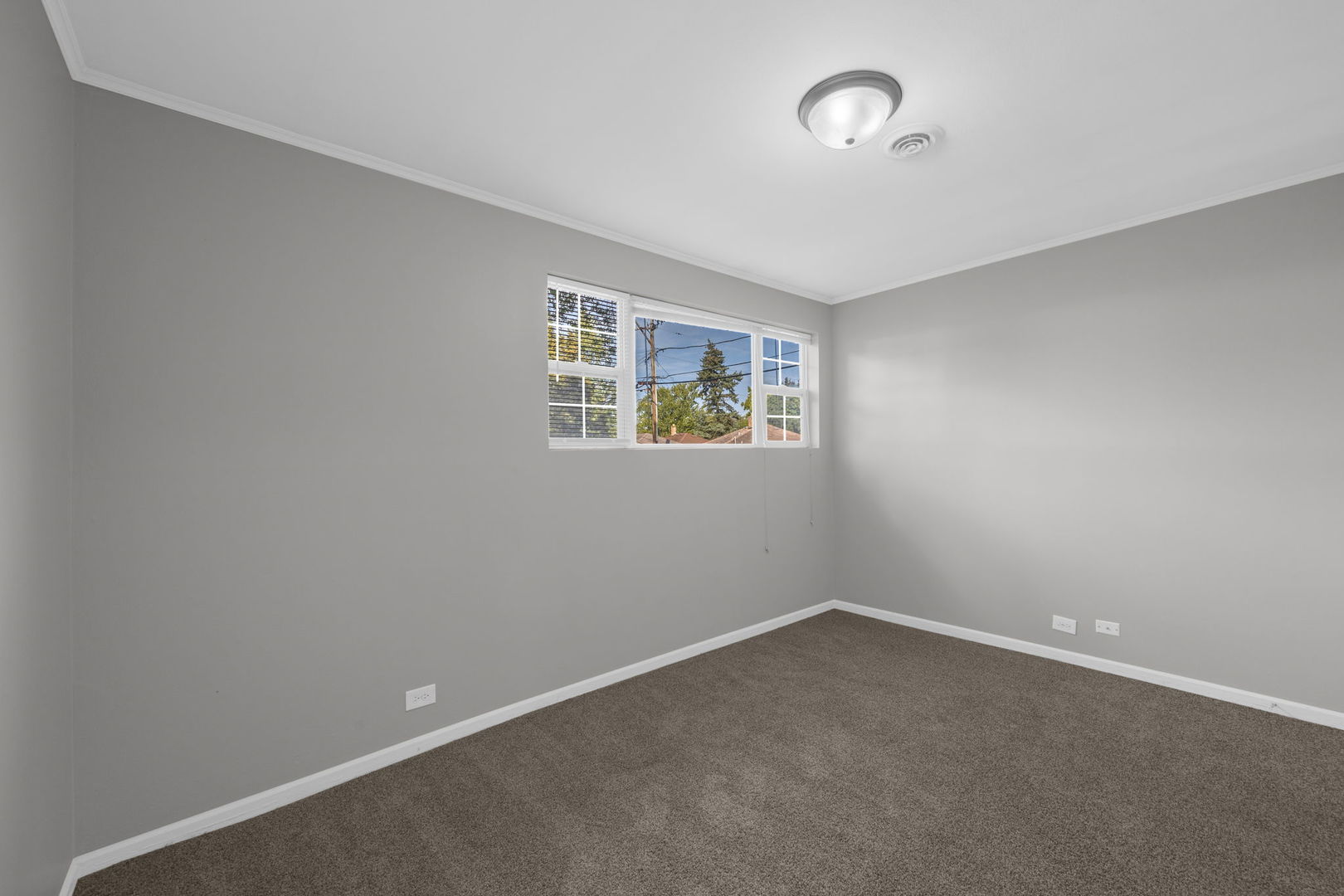 2015 Hawthorne Road Homewood, IL 60430 - Photo 8 of 16 an empty room with a window
