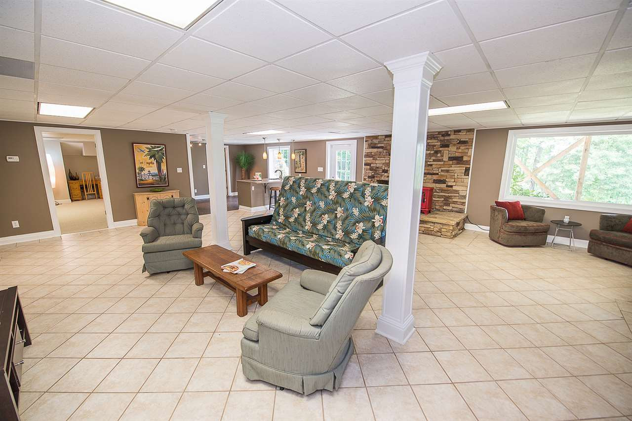 6820 Lake Wheeler Road Raleigh, NC 27603 - Photo 10 of 25 Daylight basement could be an apartment or in-law suite. View of the basement den/rec room.