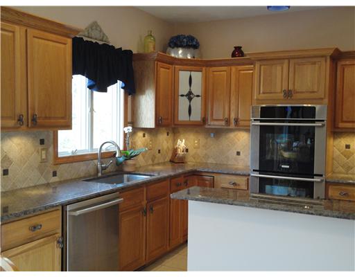 660 Gibson Hill Road Coventry, RI 02827 - Photo 3 of 11 Kitchen. New granite kitchen, breakfast bar, double oven, separate warming drawer.